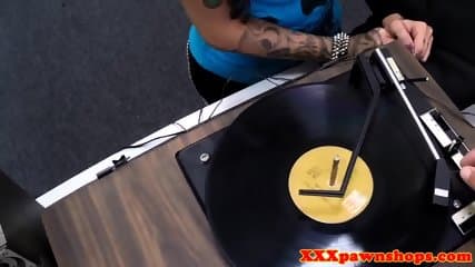 Busty tattooed teen pawns pussy on camera