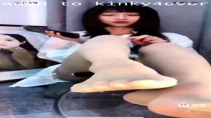 Lonely Korean Babe Displaying Her Sexy Stockinged Feet And Toes In A S