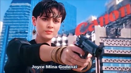Joyce Mina Godenzi BALLBUSTING at 0.34 & 1.56 kick in the balls, She Shoots Straight