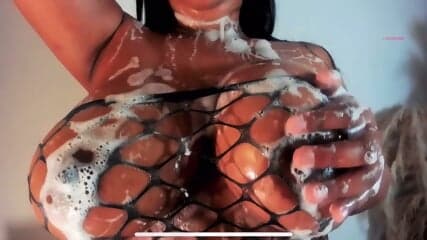 Busty Latina Deyan Huge Oily Titties Show.