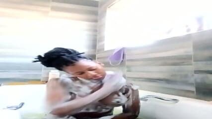 A cute 20 year old hoe taking a bath