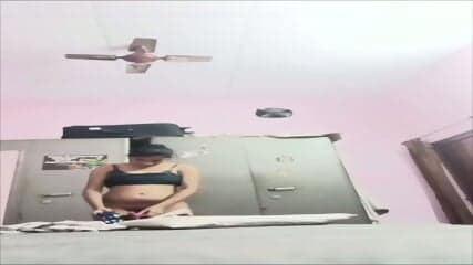 Sister changing dress caught on camera by brother