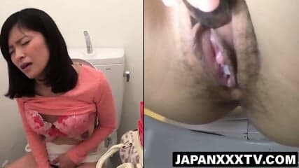 Closeup of Asian fingering to squirting finish in the toilet