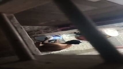 Neighbor aunty taking bath caught by voyeur