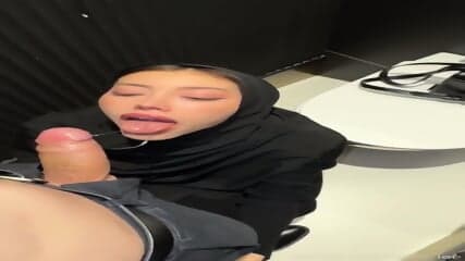 Beautiful hijab teen deep-throat in public toilet