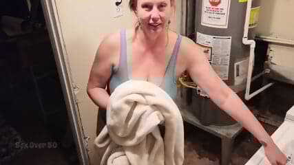 A Lonely MILF seduces a young man who rents her basement apartment